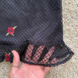 Lucy in the Sky bodycon dress with chest cutout and ruffles on bottom